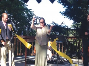Donna Briggs cutting ribbon at new Britt Performance Garden - June 2014