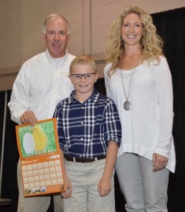 Matson (center) poses with Greg Thompson, MC and mom Alyson. Matson is a four-time winner of the contest. 