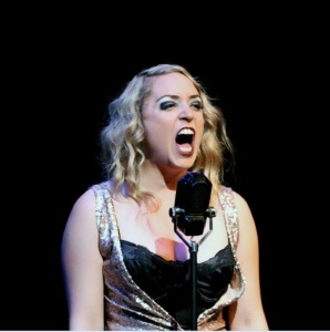 Kit Kat Club singer Sally Bowles (Jillian Van Niel) belts out a song in Oregon Cabaret Theater's production of "Cabaret".