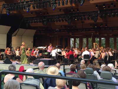 Guest singer Morgan James at the microphone and Music Director Teddy Abrams at the piano join the Britt Orchestra for the performance of Dream with Me from Leonard Bernstein’s Peter Pan on August 9, 2015 in Jacksonville, OR.